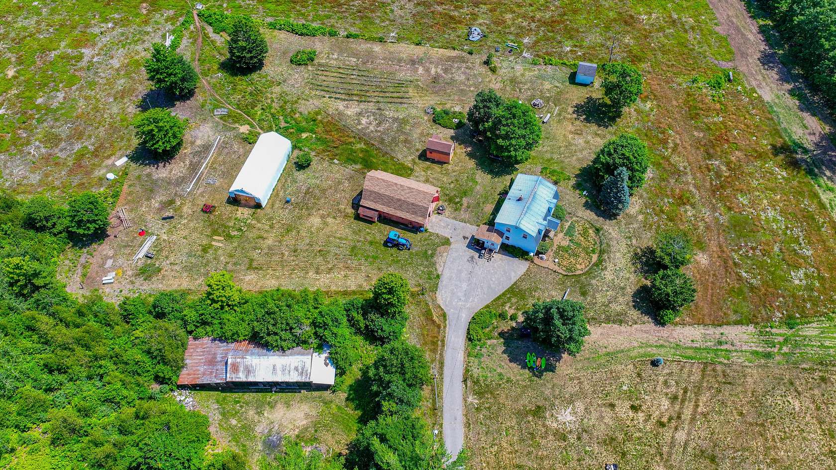3.28 Acres of Land with Home for Sale in Oxford, Maine