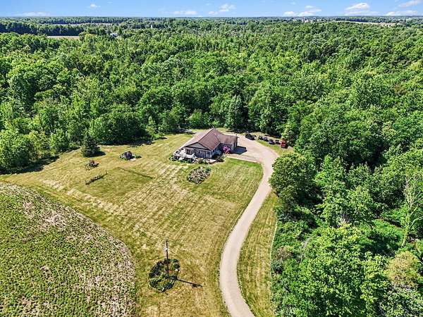 20 Acres of Recreational Land with Home for Sale in Fulton, Michigan