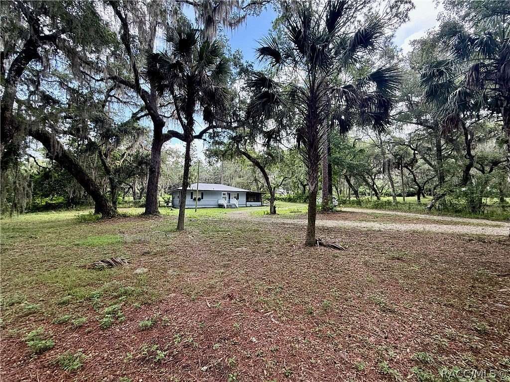1.54 Acres of Land with Home for Sale in Inglis, Florida