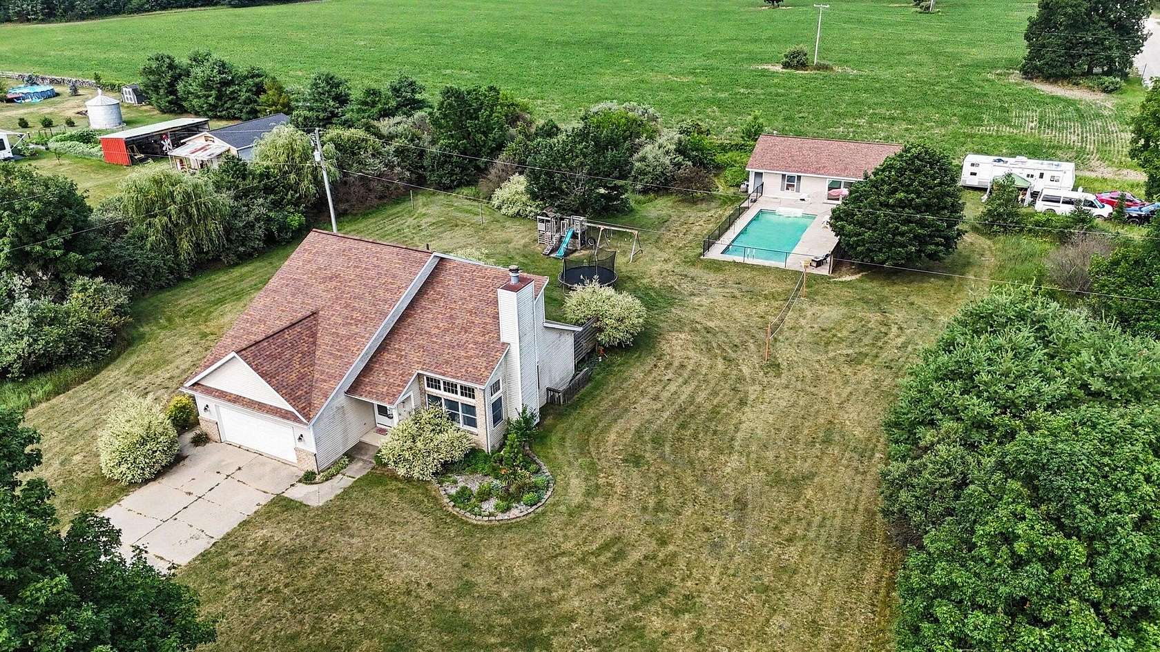 2 Acres of Land with Home for Sale in Cedar Springs, Michigan