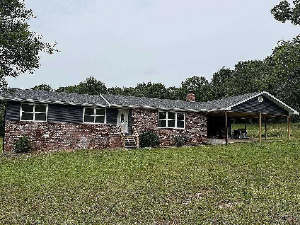 5 Acres of Land with Home for Sale in Flippin, Arkansas