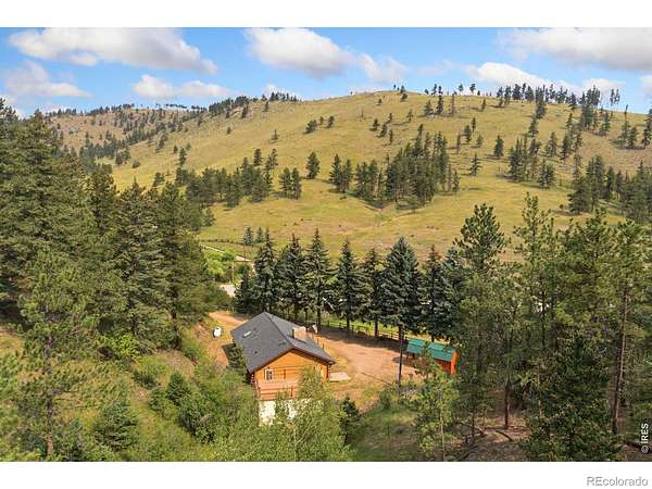 5 Acres of Land with Home for Sale in Bellvue, Colorado