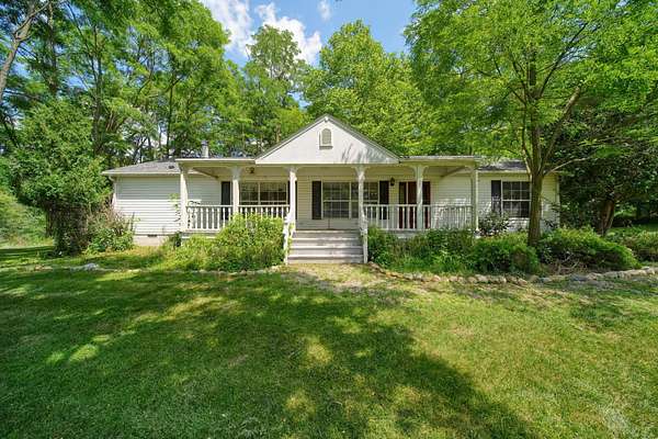 11.3 Acres of Land with Home for Sale in Hudson, Michigan