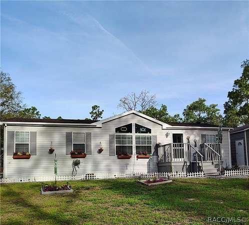 2.52 Acres of Land with Home for Sale in Dunnellon, Florida
