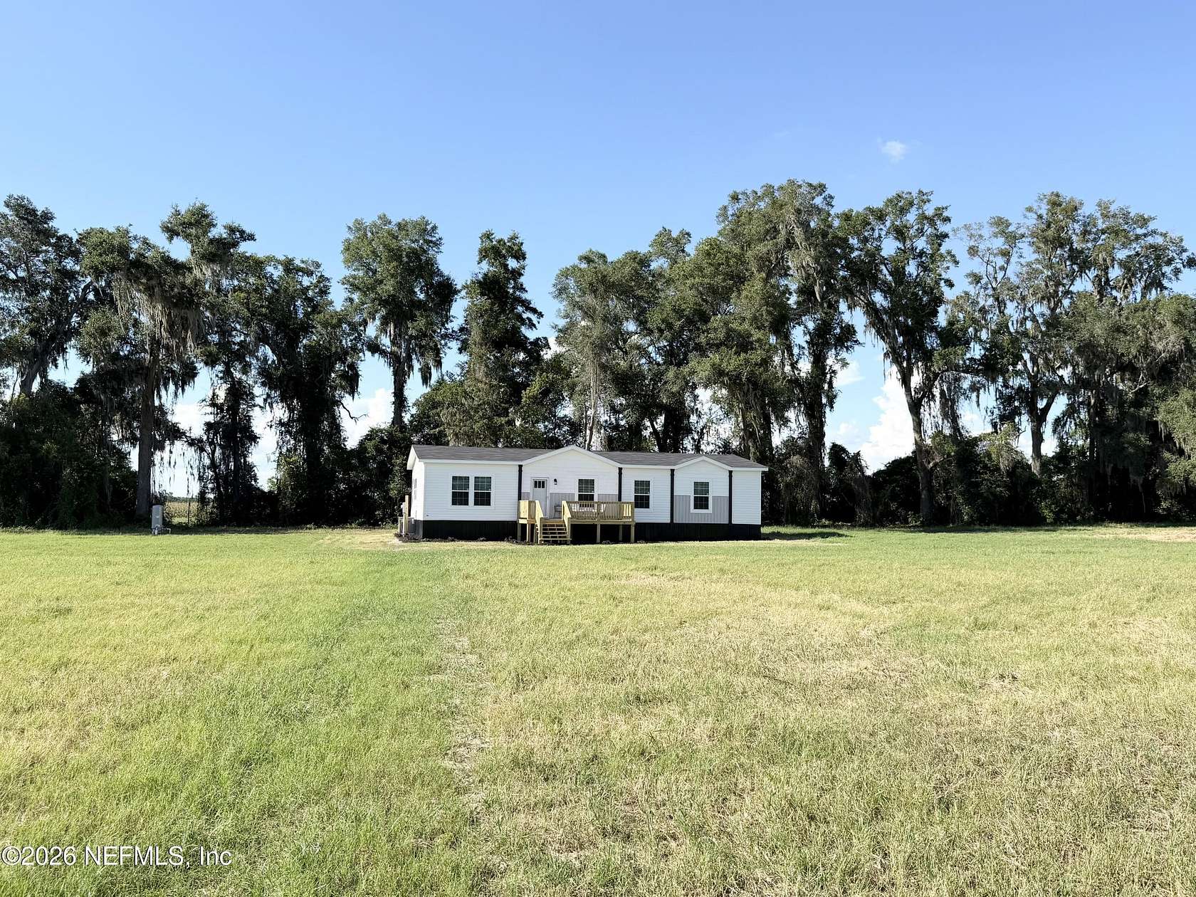 5 Acres of Land with Home for Sale in Brooker, Florida