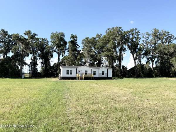 5 Acres of Land with Home for Sale in Brooker, Florida
