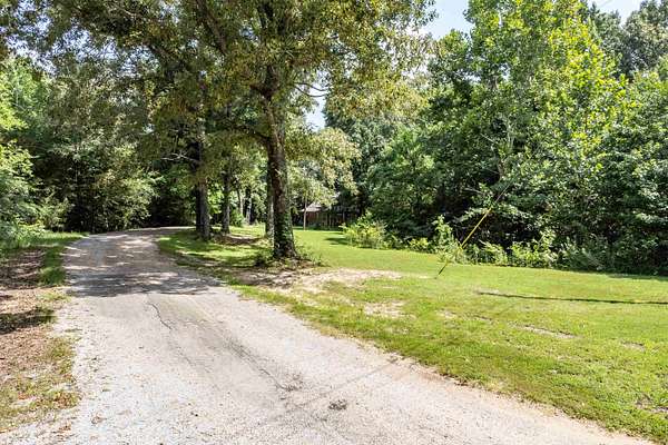 7.34 Acres of Land with Home for Sale in Mason, Tennessee