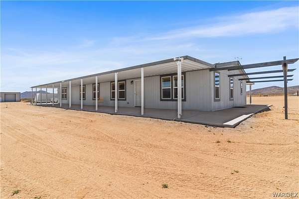 76.4 Acres of Land with Home for Sale in Kingman, Arizona