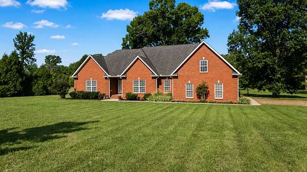 6.89 Acres of Land with Home for Sale in Christiana, Tennessee