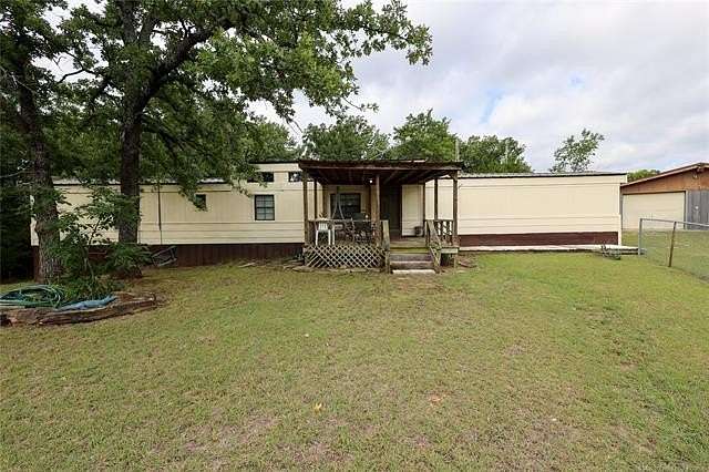 1.6 Acres of Land with Home for Sale in Sulphur, Oklahoma