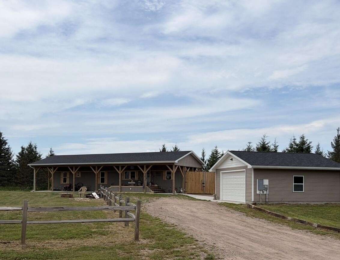 5.5 Acres of Land with Home for Sale in Brimley, Michigan