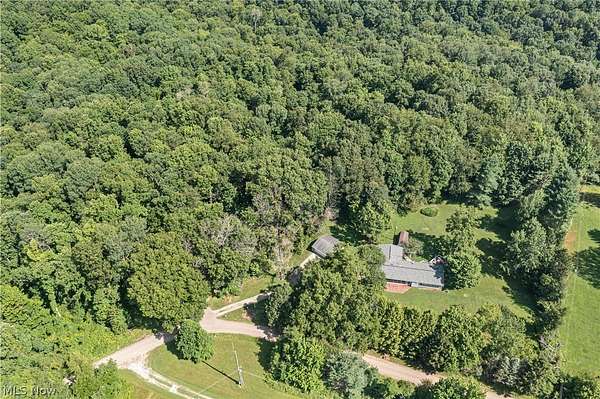 6.16 Acres of Land with Home for Sale in Kimbolton, Ohio