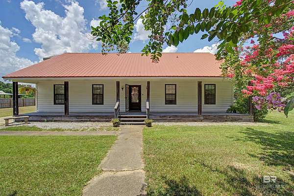 20.3 Acres of Land with Home for Sale in Chunchula, Alabama