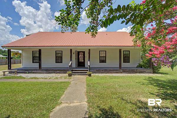 20.3 Acres of Land with Home for Sale in Chunchula, Alabama