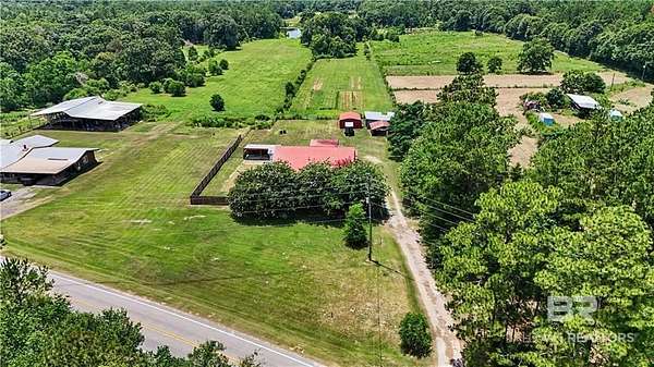 20.3 Acres of Land with Home for Sale in Chunchula, Alabama