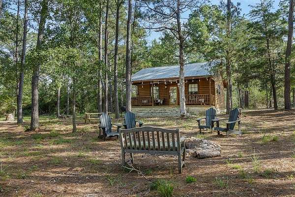 20.3 Acres of Recreational Land with Home for Sale in Winchester, Texas