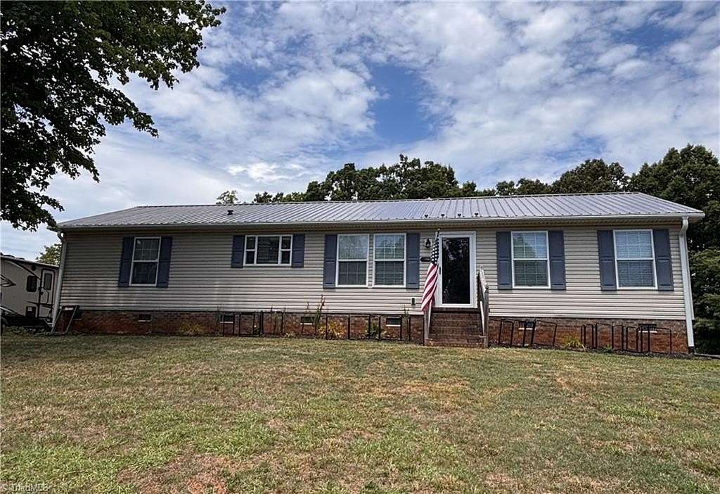 1.8 Acres of Land with Home for Sale in Sandy Ridge, North Carolina