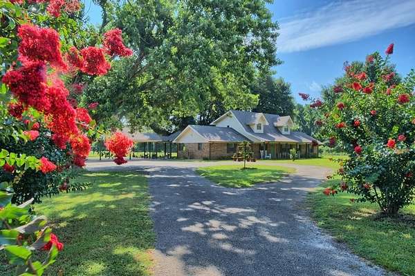 9.47 Acres of Land with Home for Sale in Milam, Texas