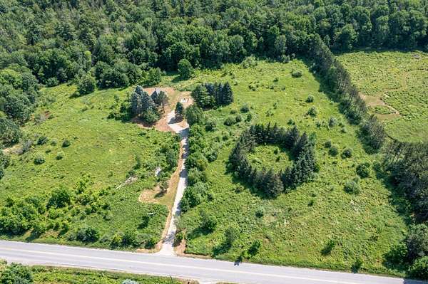 7.36 Acres of Land with Home for Sale in Belfast, Maine