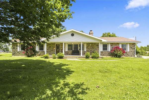 1.76 Acres of Land with Home for Sale in Buffalo, Missouri