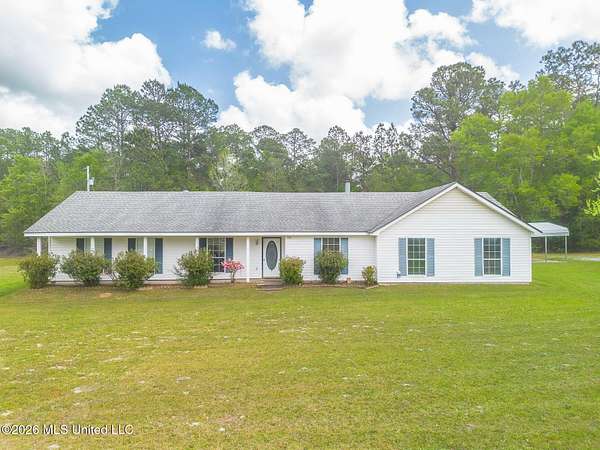 2.9 Acres of Land with Home for Sale in Kiln, Mississippi