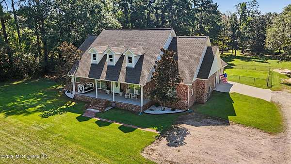 7 Acres of Land with Home for Sale in Kiln, Mississippi
