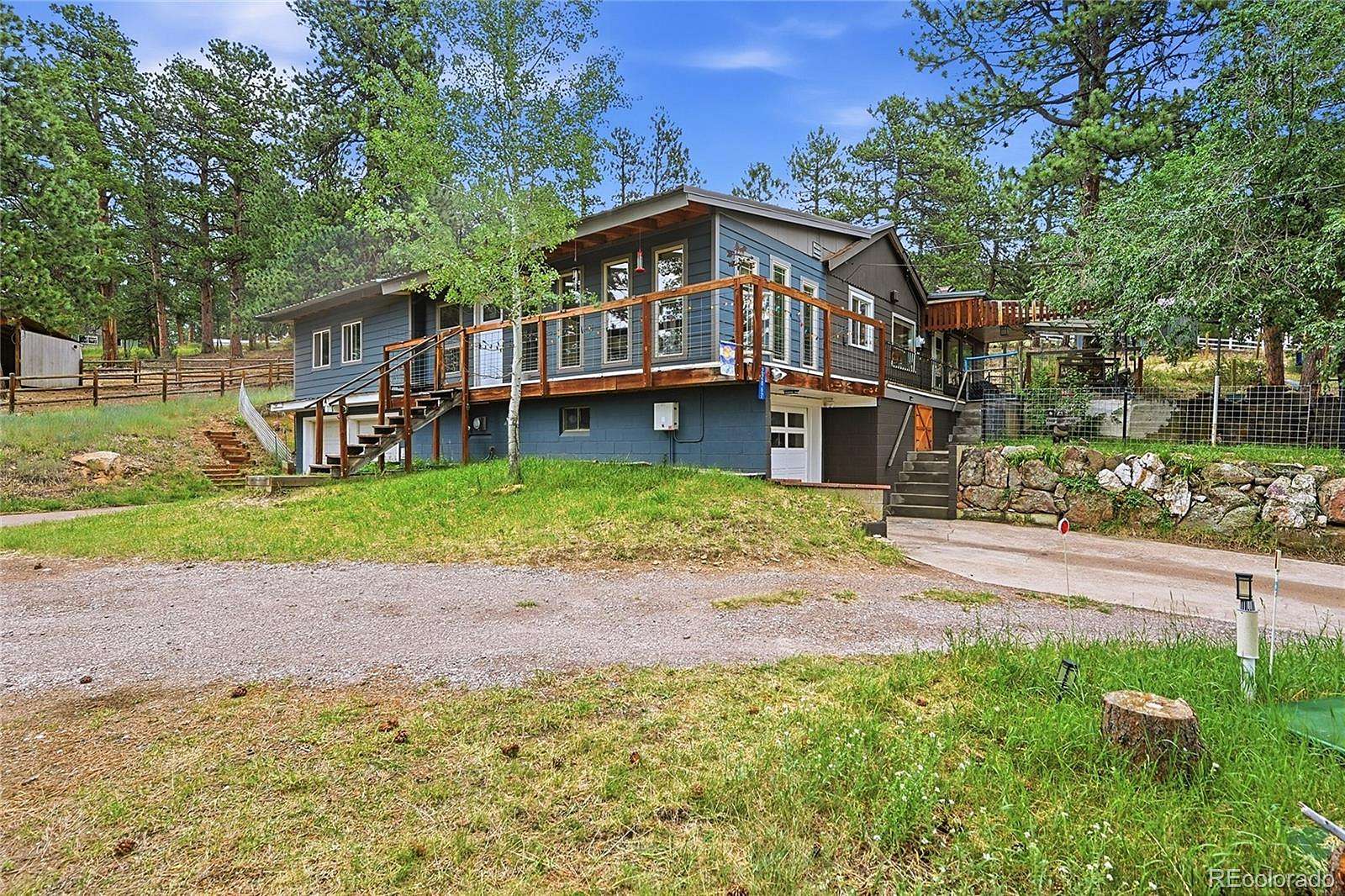 2.64 Acres of Land with Home for Sale in Indian Hills, Colorado