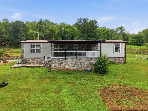 13.4 Acres of Land with Home for Sale in Riddleton, Tennessee