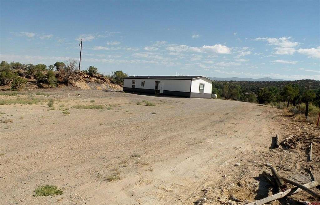 2.7 Acres of Land with Home for Sale in Nucla, Colorado