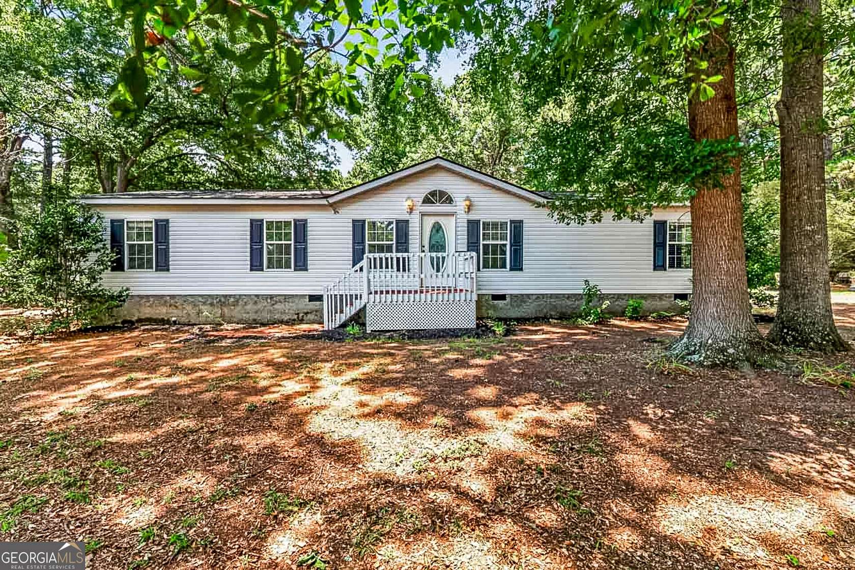 2.59 Acres of Land with Home for Sale in McDonough, Georgia