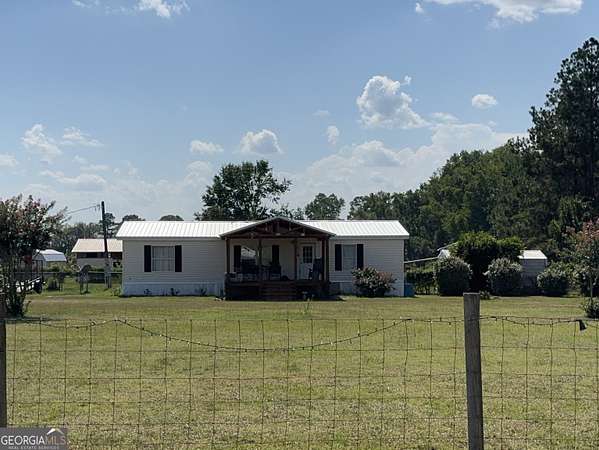 3.2 Acres of Land with Home for Sale in Metter, Georgia