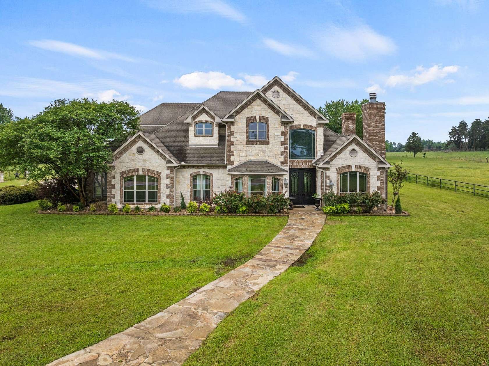 7.4 Acres of Land with Home for Sale in Pittsburg, Texas