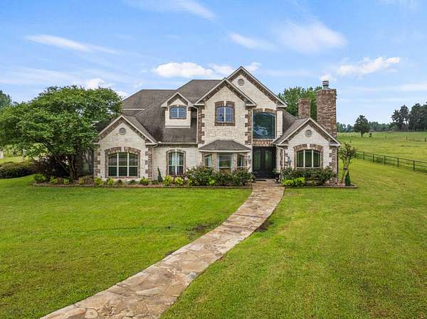 7.4 Acres of Land with Home for Sale in Pittsburg, Texas
