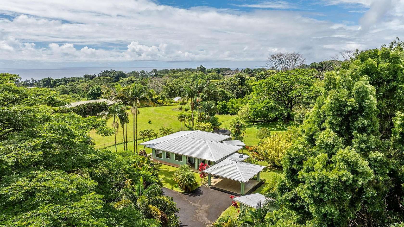 5.13 Acres of Land with Home for Sale in Pepeekeo, Hawaii