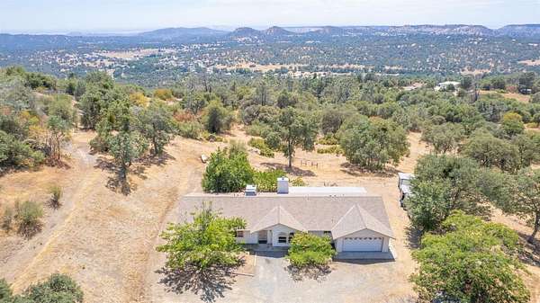 12.3 Acres of Land with Home for Sale in Auberry, California