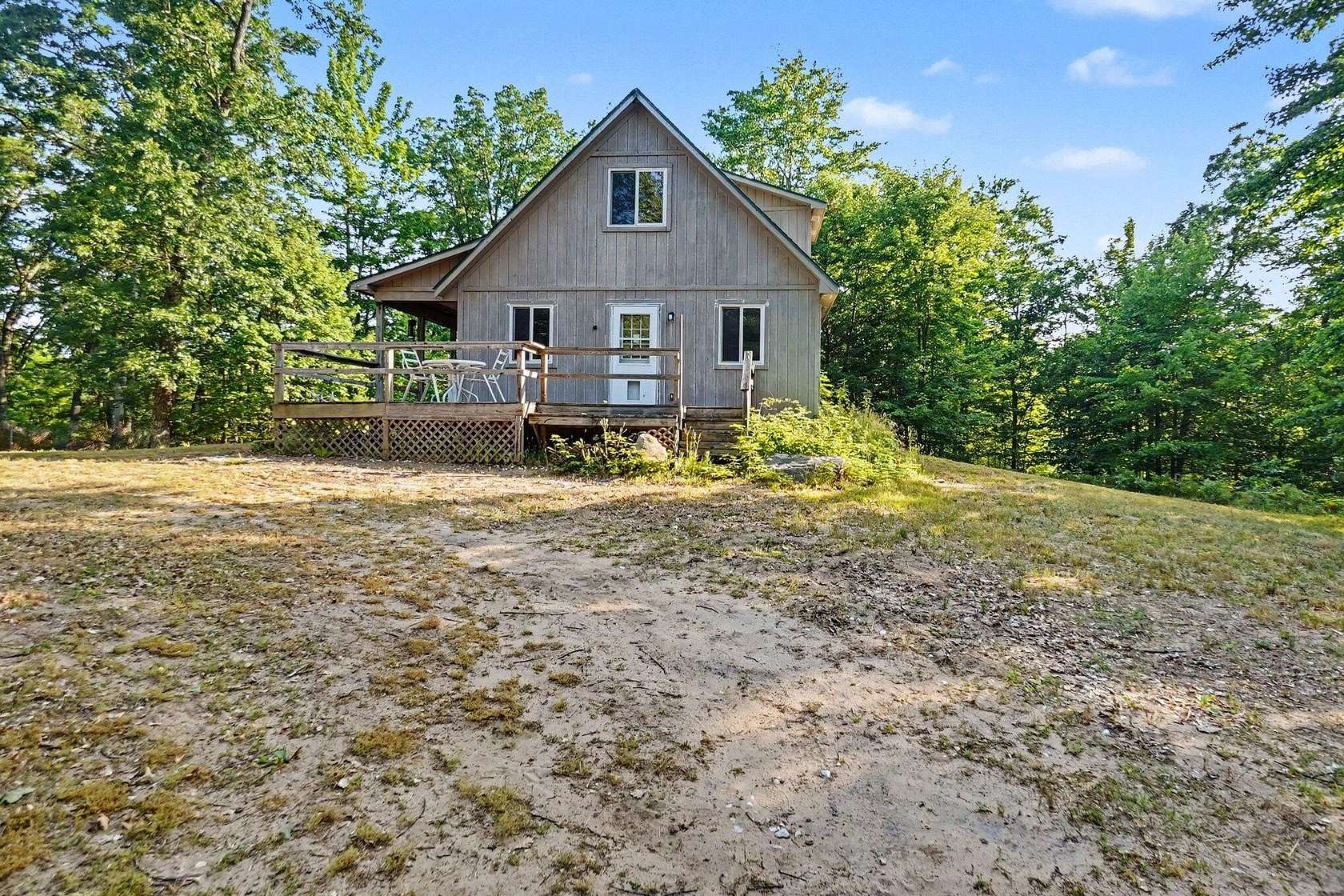 10 Acres of Recreational Land with Home for Sale in Reed City, Michigan