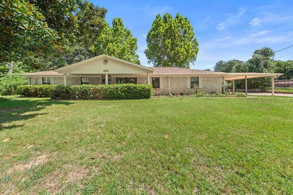 3.29 Acres of Land with Home for Sale in Palestine, Texas