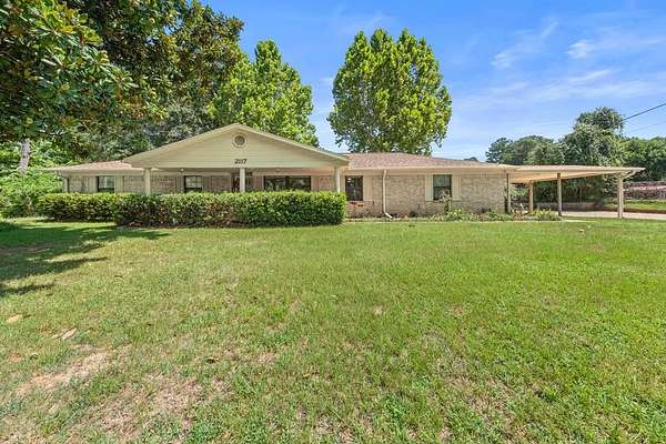 3.29 Acres of Land with Home for Sale in Palestine, Texas