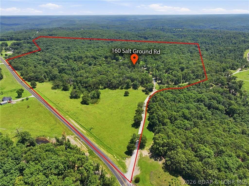 54 Acres of Land with Home for Sale in Macks Creek, Missouri