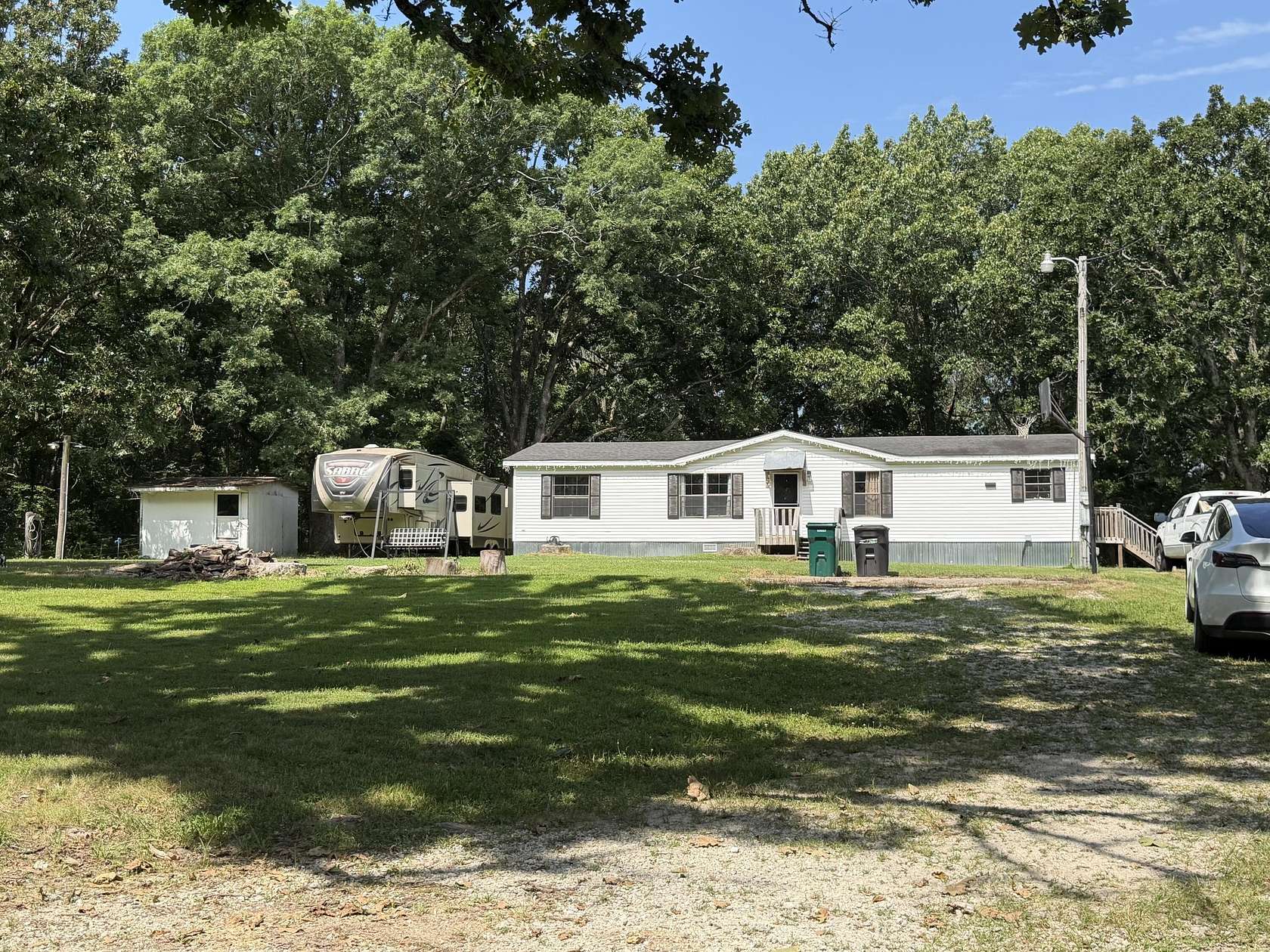 9.8 Acres of Land with Home for Sale in Galena, Missouri