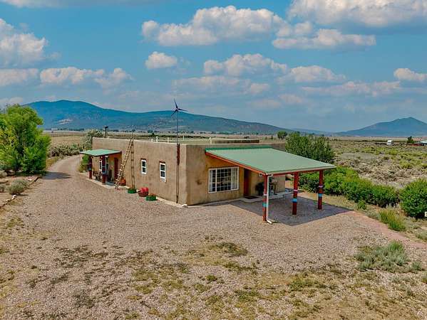 9.77 Acres of Land with Home for Sale in Cerro, New Mexico