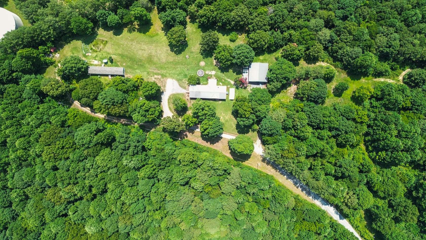 28 Acres of Land with Home for Sale in Crandall, Georgia
