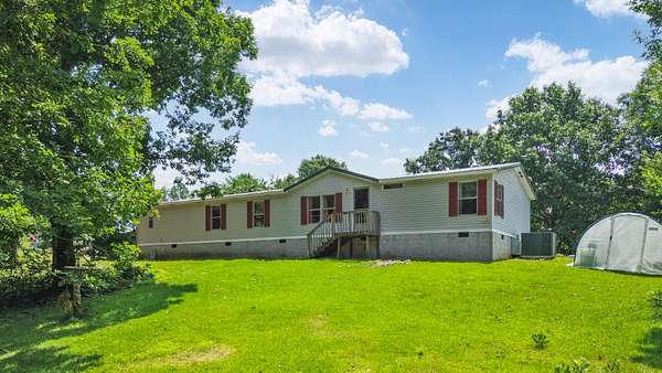 28 Acres of Land with Home for Sale in Crandall, Georgia