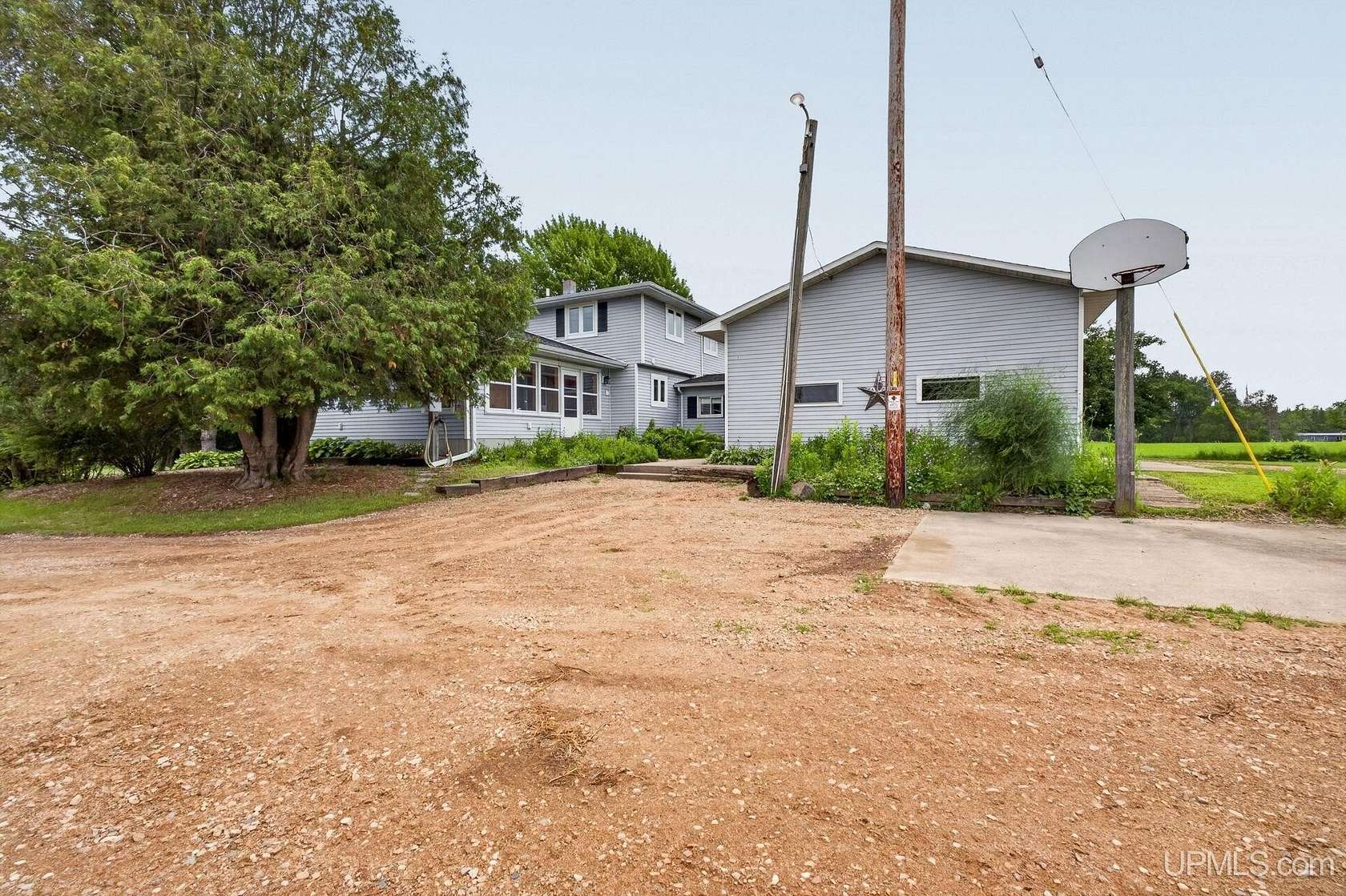 5 Acres of Land with Home for Sale in Menominee, Michigan