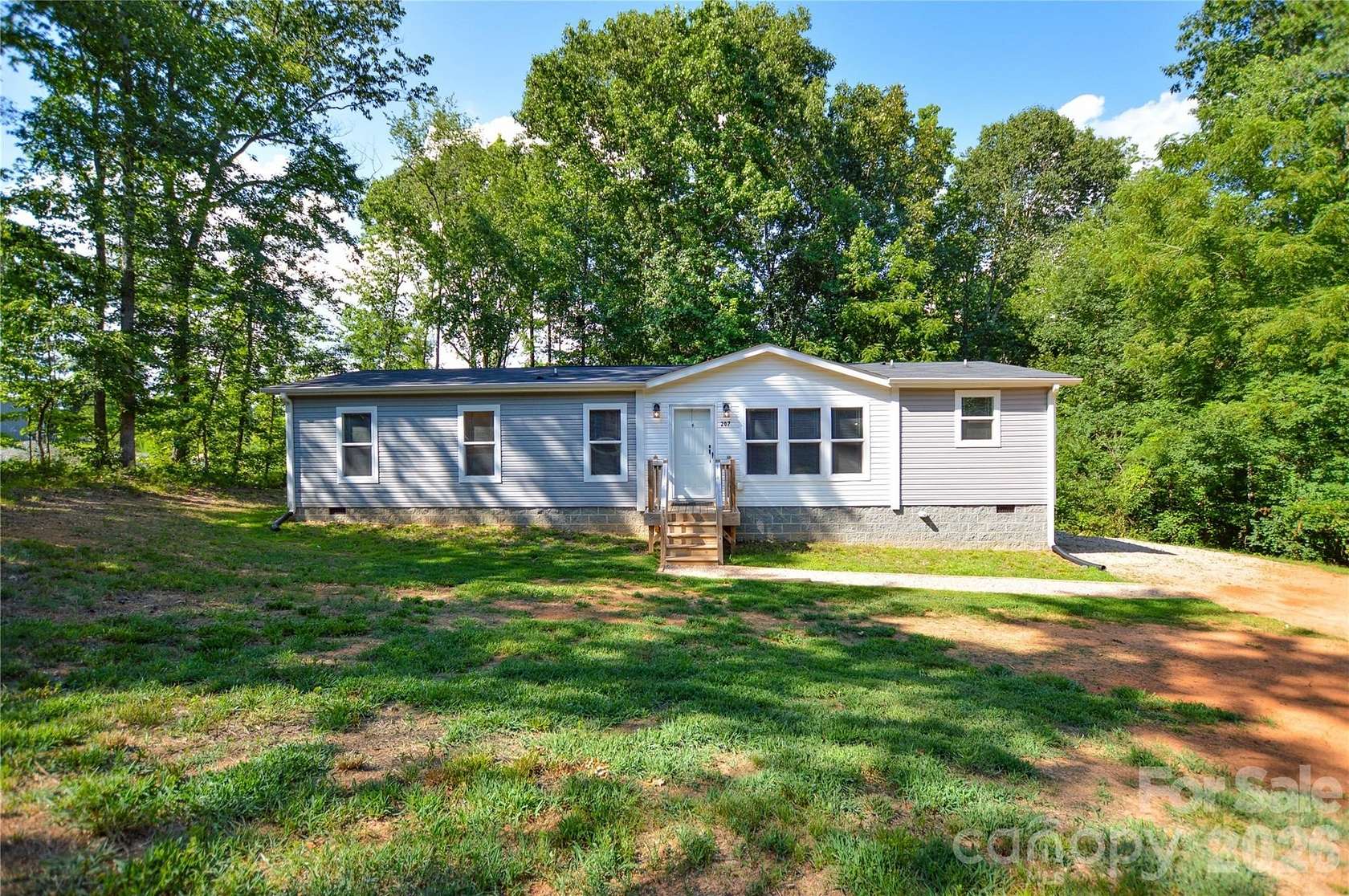 2.26 Acres of Land with Home for Sale in New London, North Carolina