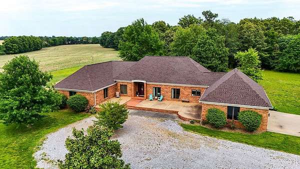 5.74 Acres of Land with Home for Sale in Mayfield, Kentucky