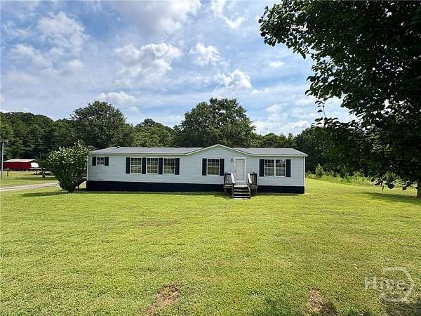 1.56 Acres of Land with Home for Sale in Colbert, Georgia