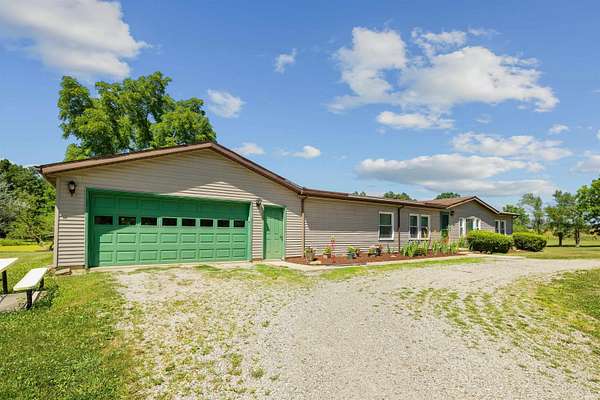 10 Acres of Recreational Land with Home for Sale in Spencerville, Indiana
