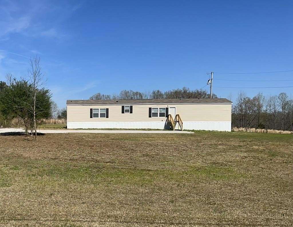 1.56 Acres of Land with Home for Sale in Baldwyn, Mississippi