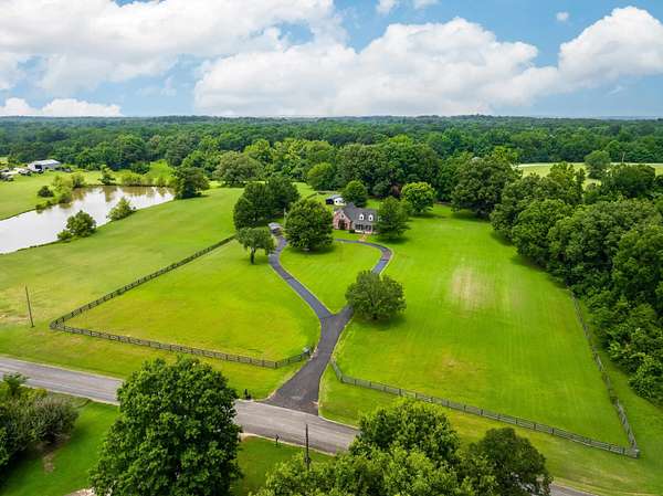 5.47 Acres of Land with Home for Sale in Moscow, Tennessee